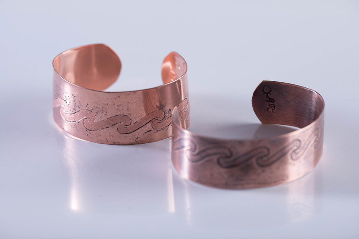 Amanda Rutland copper cuffs with water etching | on Art Biz Succes