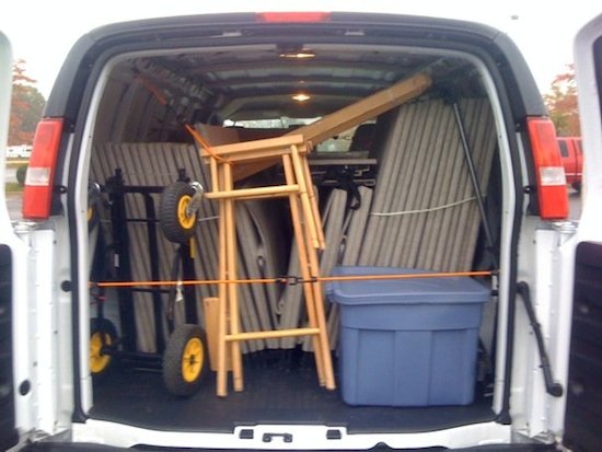Patty Hankins loads up her Chevy van with her booth set-up. Used with permission. 