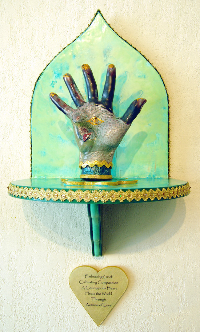 ©Debbie Mathew, Healing Hand. Mixed media, 24 x 11 x 8.5 inches. Used with permission.