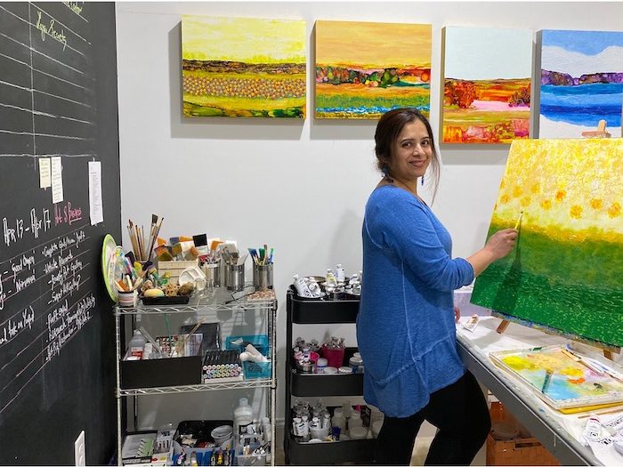 Pennsylvania artist Vidya Shyamsundar working in her studio. Photo courtesy of her daughter, Nivedita Shyamsundar. 