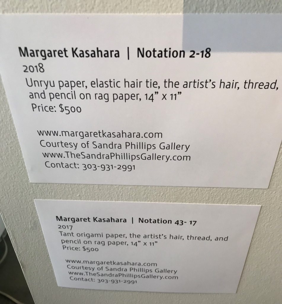 Wall labels for Margaret Kasahara.