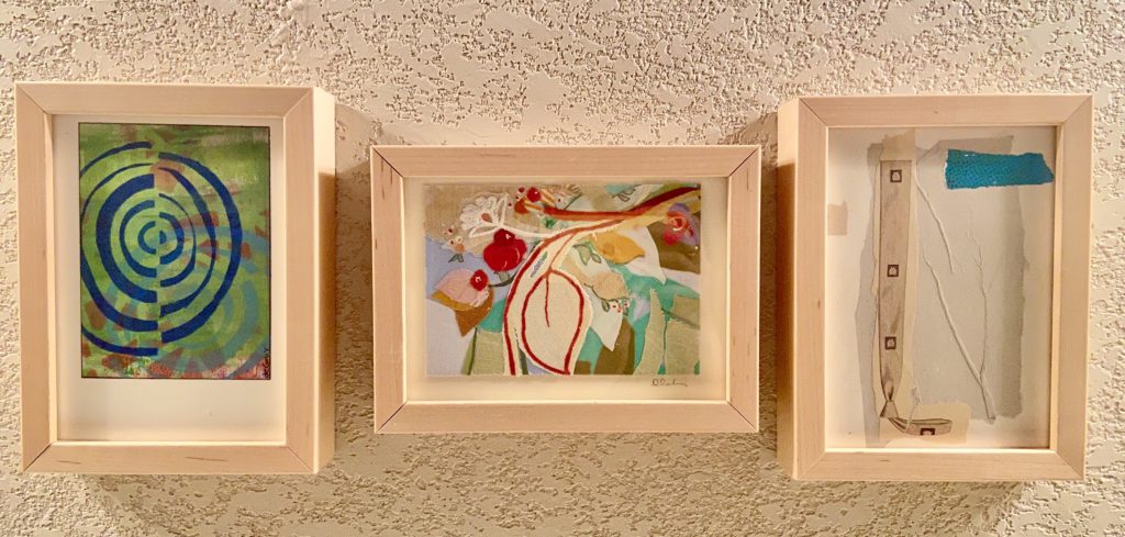 Framed handmade cards by artists