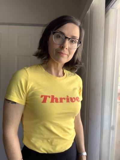 Artist Jennifer Printz wearing Thrive
