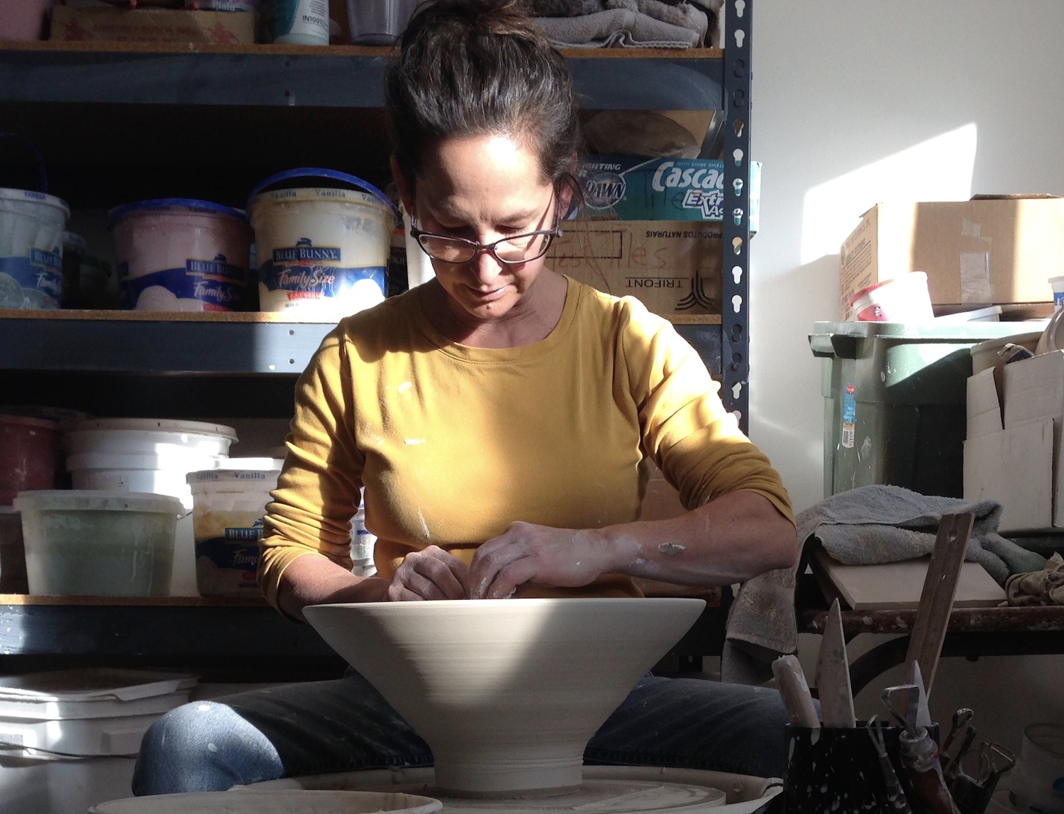 Nicole Copel at her pottery wheel